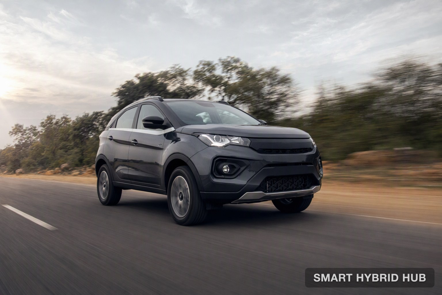 A hybrid hatchback accelerating on an open road